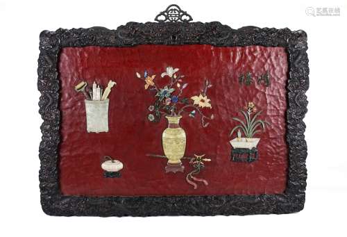 Chinese lacquer wall hanging panel with carved soapstone decorations.