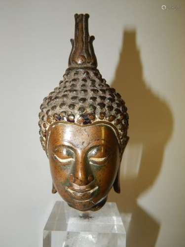 Tête de bouddha, en bronze. Siam, XIXème s. H : 12...