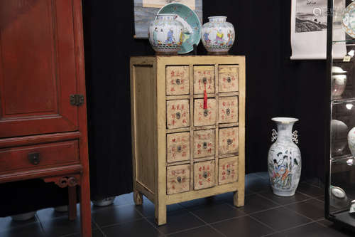 antique Chinese pharmacy chest with 12 drawers, each with a scripture