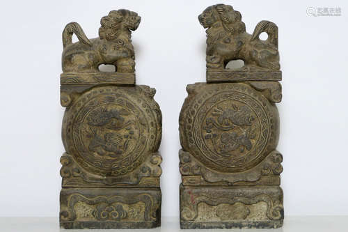 pair of Chinese temple lion sculptures in stone