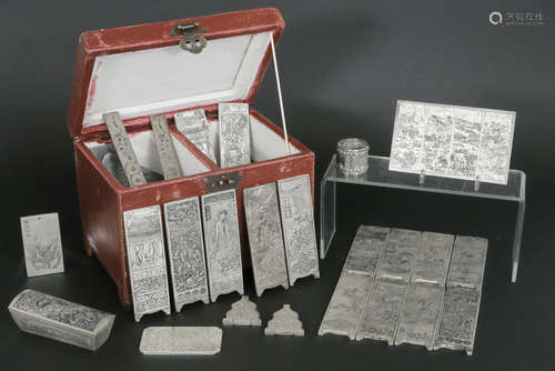 several Chinese silver bars in a wooden box