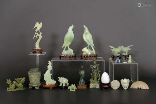 several Chinese sculptures in jade