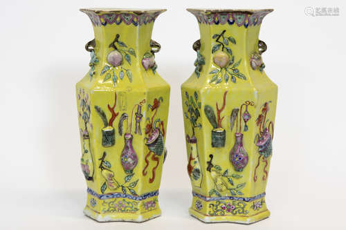 pair of small antique Chinese vases in porcelain with polychrome relief decor