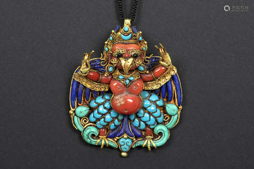 nice Tibetan “Garuda” sharm pendant in yellow gold (20/22 carat) with turquoise, lapis lazuli, red coral