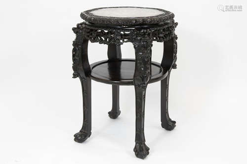 antique Chinese occasional table in richly carved rosewood and with a marble top