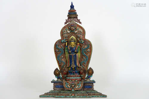 superb, quite big Tibetan tantric-buddhistic sculpture in silver (and gold), adorned with fine filigrees and all kinds of (semi-)precious stones and with the representation of ‘Manjushri’, carved in lapis lazuli