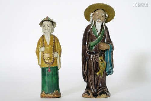 2 Chinese sculptures in glazed earthenware – one (Mud man) is marked and sealed underneath and with contraband (opium ?) inside