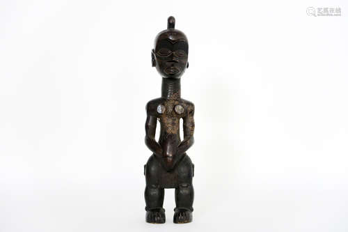 circa 1930s’ African male figure sculpture from the “Baule” in Ivory Coast in wood with a dark patina