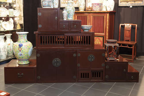 Chinese cabinet shaped as stairs in lacquered wood with doors on both sides