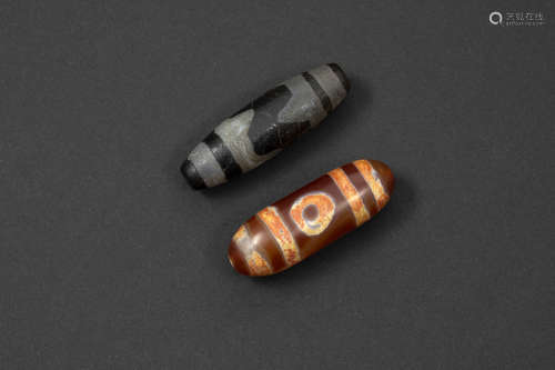 2 original ‘dzi’-stones (female shape)