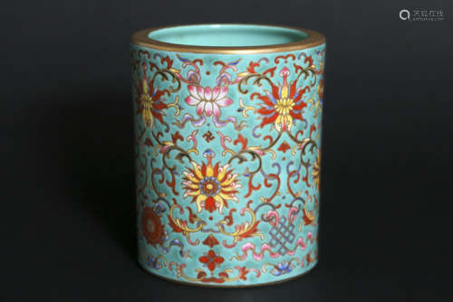 Chinese brushpot in marked porcelain with polychrome decor on turquoise background