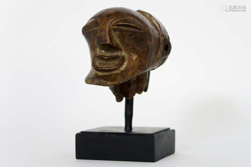 probably early 20th Cent. African Congolese “nkisi” fragment sculpture (stylized human head) from the ‘Songye’ in wood with nice patina