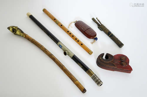 several old Chinese items : a pipe and scales (with its holder) for opium and glasses (with its case) and an antique Chinese sticks’ set