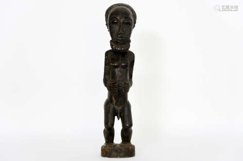 mid 20th Cent. African Congolese “Lulua” female figure sculpture in wood with dark brown patina