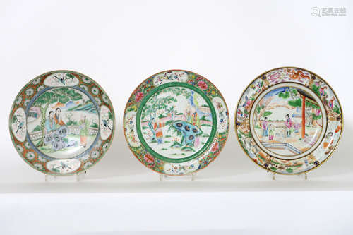 three antique Chinese plates in porcelain with a rich polychrome decor with figures