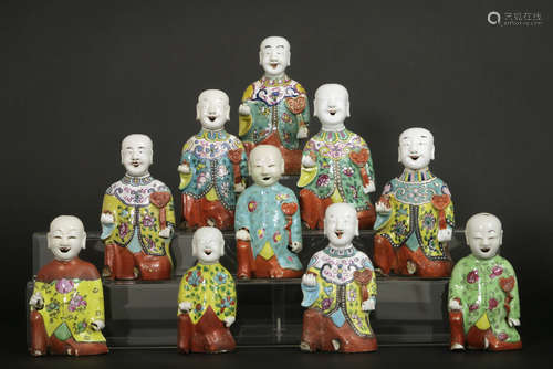 ten 18th/19th Cent. Chinese “laughing boys” in porcelain with typcial polychrome decoration