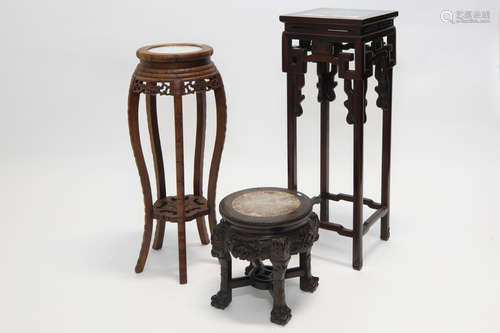 three Chinese pedestals with marble top