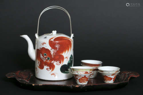 Chinese teaset with teapot and 7 cups on a tray