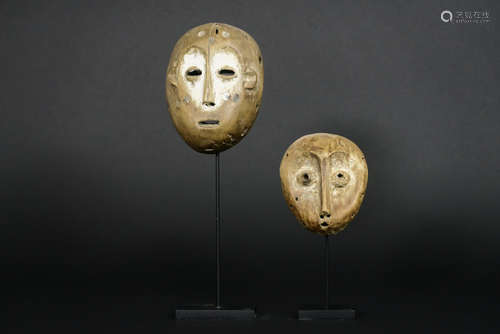 two Congolese ‘Lega’ masks in wood