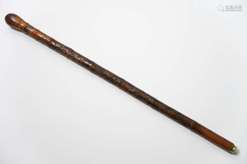 antique Chinese walkingstick in sculpted bamboo and with a hidden dagger with grip in ivory