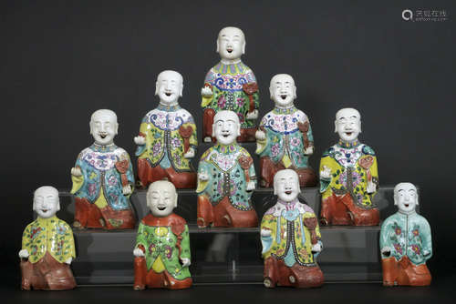 ten 18th/19th Cent. Chinese “laughing boys” in porcelain with typcial polychrome decoration