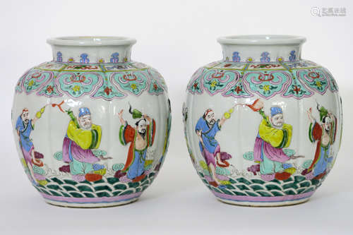 pair of Chinese vases in marked porcelain with a polychrome (relief) decor with figures