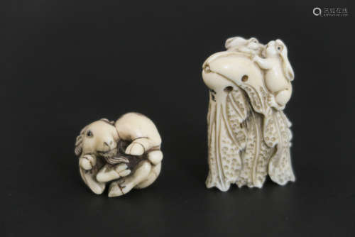 two late 19th Cent. Japanese netsuke in ivory, one with two rabbits and one with a ram