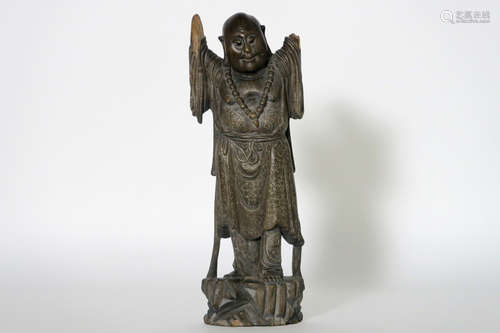 antique Chinese sculpture in wood with silver inlay