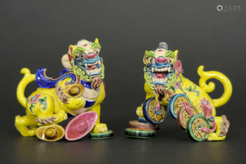 pair of small and cute Chinese temple lions in marked porcelain