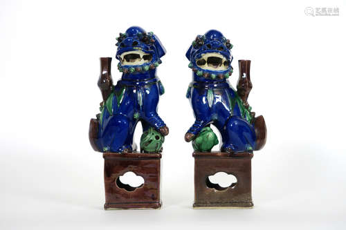 pair of antique Chinese temple lions in porcelain