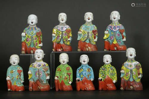 ten 18th/19th Cent. Chinese “laughing boys” in porcelain with typcial polychrome decoration