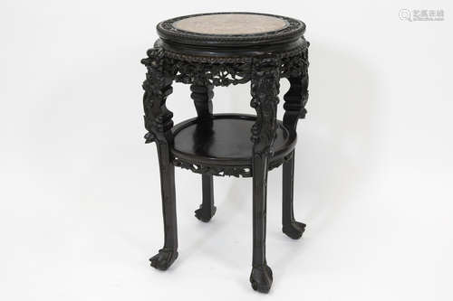 antique Chinese occasional table in richly carved rosewood and with a marble top