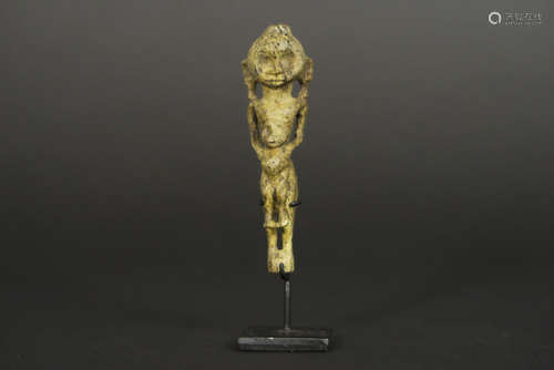 small old Indonesian maternity figure from the “Leti” on Tanimbar in whale bone