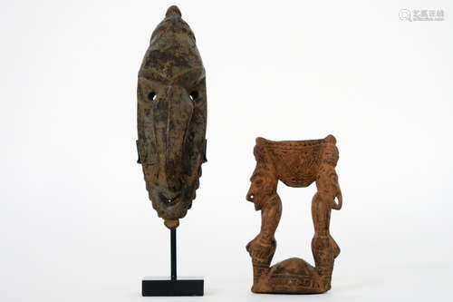 two Papua New Guinean “Sepik” sculptures in wood : a small mask and a ceremonial drinking bowl (on two typical figures)