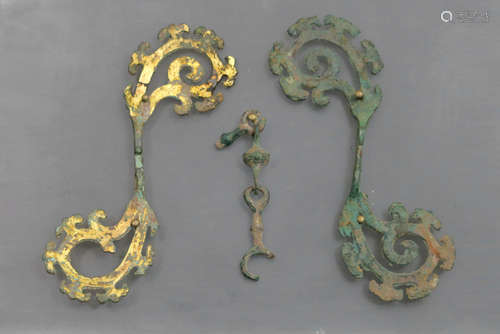 Chinese probably Han period tomb find : reinholders (for horses) in bronze with remains of the original gold leaves