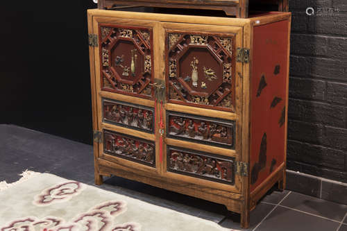 antique Chinese cabinet with sculpted panels with jade inlay