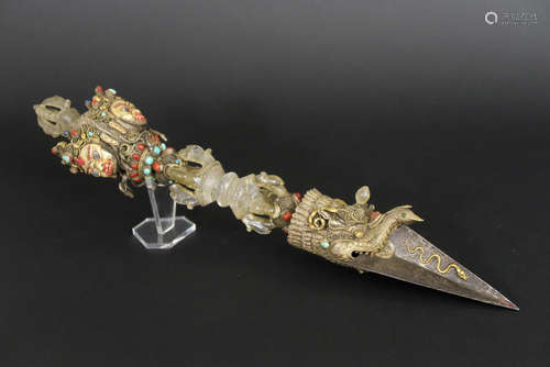 very nice, quite big and old tantric-buddhistic ritual ‘phurba’ dagger, probably made to adorn a temple sculpture, in metal, gold, rockcrystal and silver with turquoise and red coral and with “Bhairava” heads in painted bone