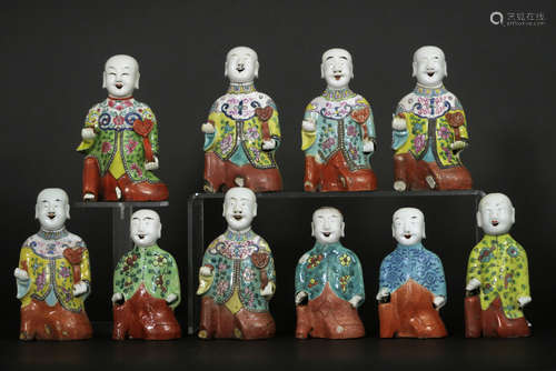 ten 18th/19th Cent. Chinese “laughing boys” in porcelain with typcial polychrome decoration