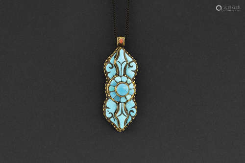 tantric buddhistic “vajra” sharm in yellow gold (20/22 carat) with turquoise and a small red coral cabochon