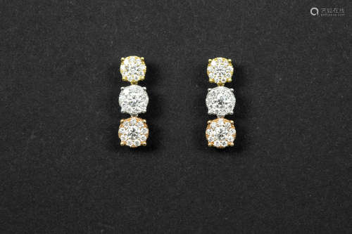 pair of earrings in white, pink and yellow gold (18 carat) and with ca 0,80 carat of high quality brilliant cut diamonds