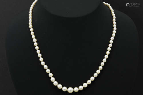 pearl necklace with an oval Art Deco clasp in platinum with old bolsjevic cut diamonds