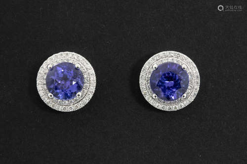 very classy pair of round earrings in white gold (18 carat) with ca 6,40 carat of tanzanite with very nice color and ca 1,30 carat of very high quality brilliant cut diamonds