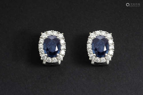pair of earrings in white gold (18 carat) with ca 2,20 carat of sapphire and at least 0,70 carat of high quality brilliant cut diamonds