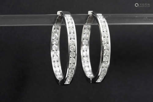 pair of earrings in white gold (18 carat) with ca 4,90 carat of very high quality brilliant cut diamonds