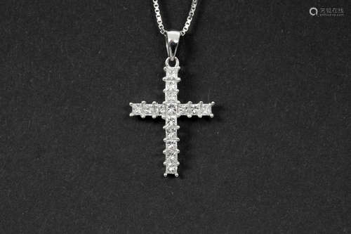 cross shaped pendant in white gold (18 carat) with ca 0,60 carat of high quality brilliant cut diamonds – with a chain in white gold (18 carat)