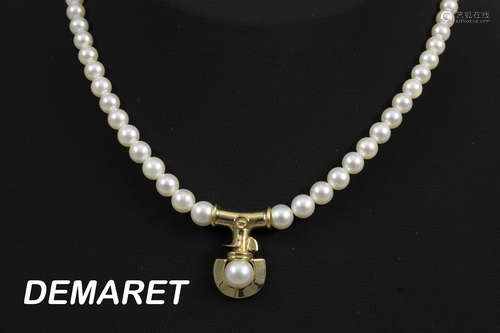 ’Demaret’ necklace with pearls and a lock and pendant (with pearl) in yellow gold (18 carat) – marked