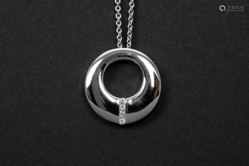 pendant in white gold (18 carat) with high quality brilliant cut diamonds and with a chain in white gold (18 carat)