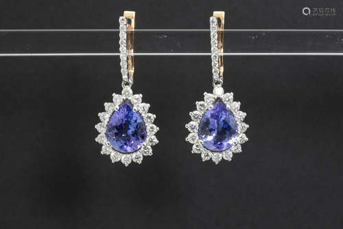 nice pair of earrings in pink and white gold (18 carat) with ca 4,30 carat of tanzanite with a very nice color and ca 1,90 carat of very high quality brilliant cut diamonds