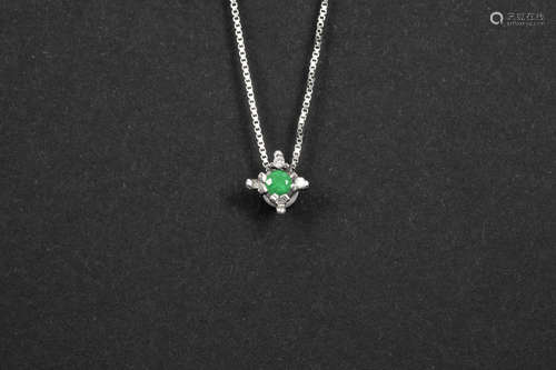 pendant in white gold (18 carat) with an emerald and high quality brilliant cut diamonds – on a chain in white gold (18 carat)