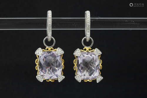 pair of earrings in yellow and white gold (18 carat) with ca 10 carat of briolet cut amethysts and ca 0,25 carat of very high quality brilliant cut diamonds